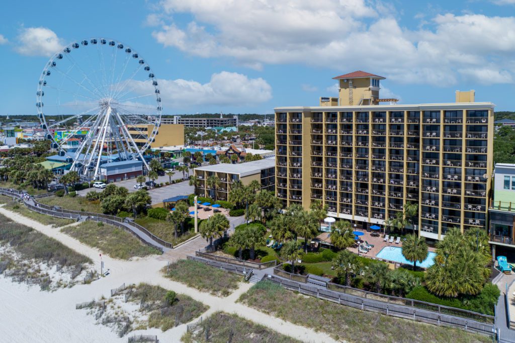 Oceanfront view of Holiday Inn at the Pavilion and top Myrtle Beach Boardwalk Attractions