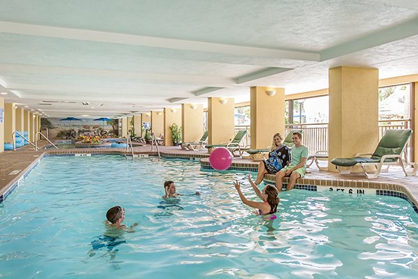 Family playing in Holiday Inn Pool