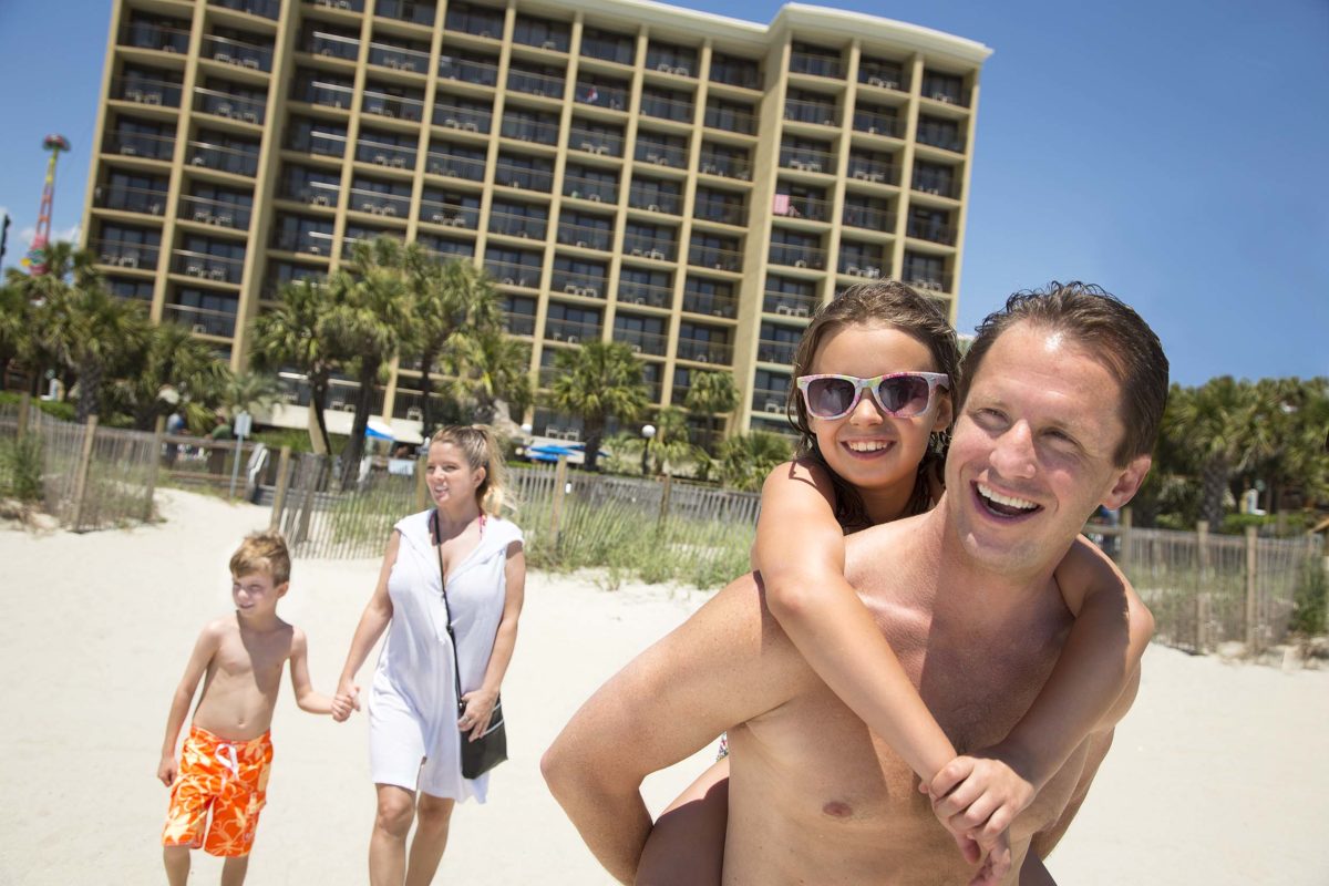 Family on the Beach at Holiday Inn – "At the Pavilion"
