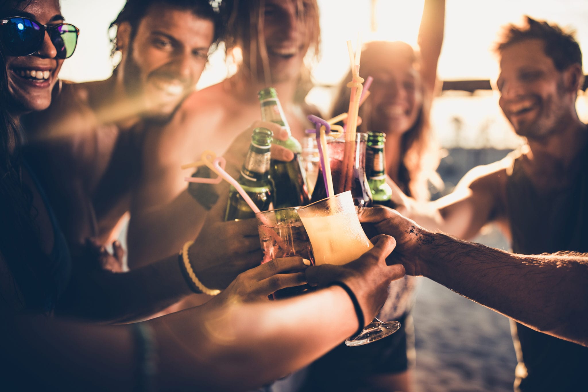 Friends enjoying drinks at the best bars on the myrtle beach boardwalk.